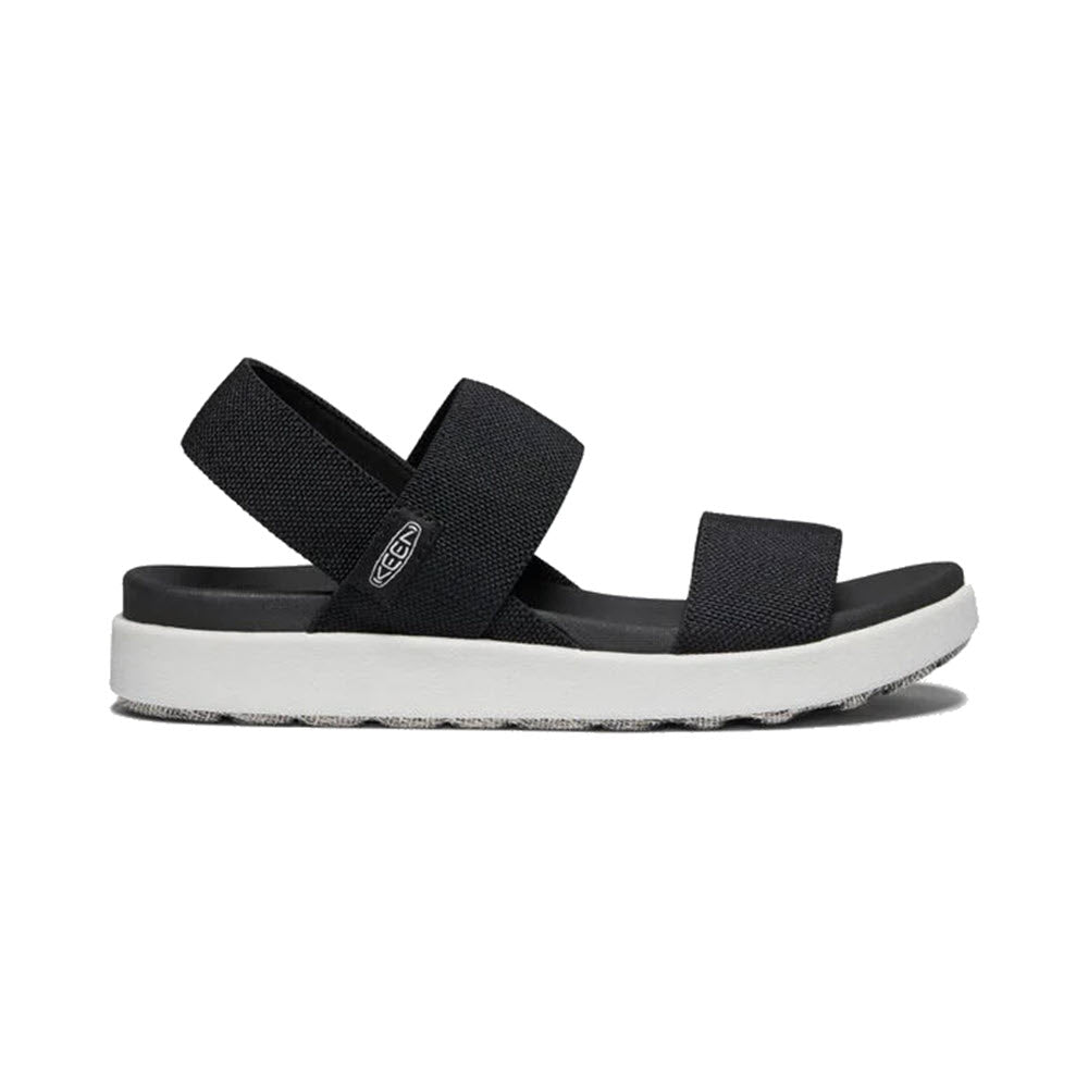 Keen black strap sandal with white sole and cushioned footbed.