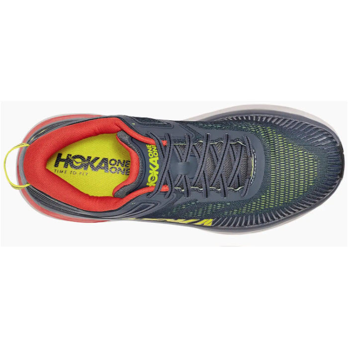 Top-down view of a gray Hoka Bondi 7 Turbulence/Chili running shoe with a yellow insole and red accents, featuring Meta-Rocker technology for a cushioned ride.