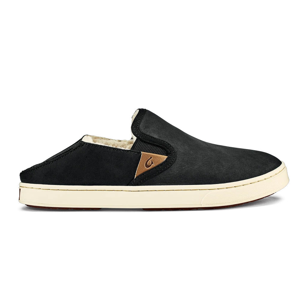 Olukai slip-on shoe with a shearling lining and white sole.