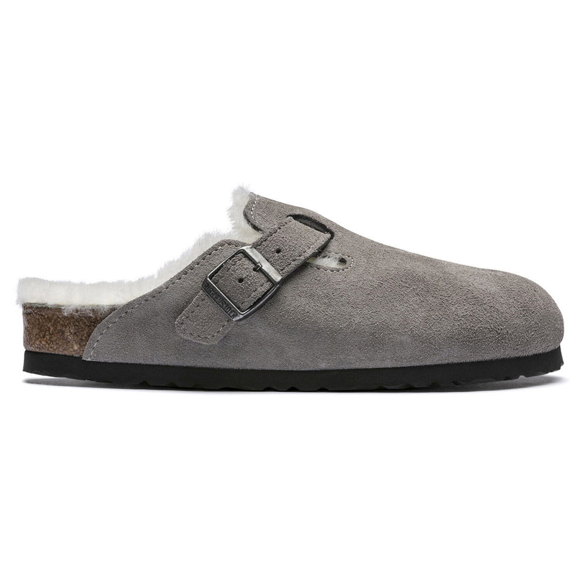 Gray suede Birkenstock Boston Shearling Stone Coin clog slipper with a shearling lining and buckle detail.