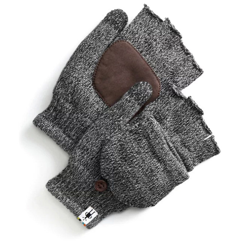A pair of black Smartwool Cozy Grip Flip Mitts with touch screen capability, a brown suede patch, and a decorative button.