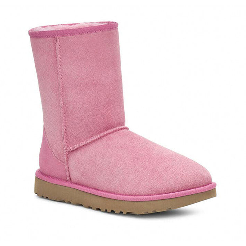 A pink UGG Classic Short II Wild Berry boot with a flat sole displayed against a white background.