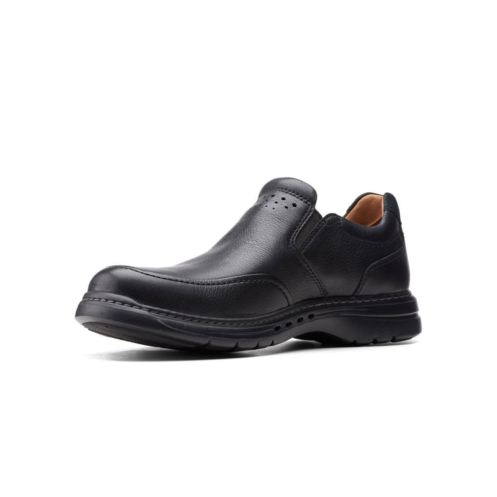 A single Clarks black leather men&#39;s dress shoe with a low heel and elastic side panels, featuring an OrthoLite® footbed, displayed on a plain white background.