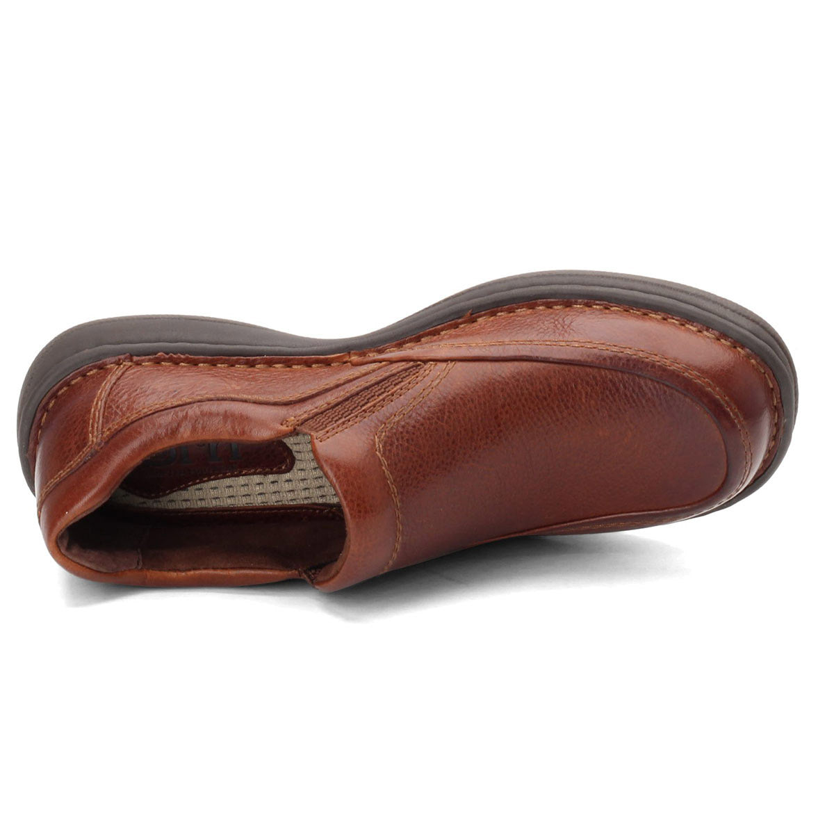 Born Blast III Slip On Dark Tan loafer shoe featuring Opanka hand-crafted construction, on a white background.