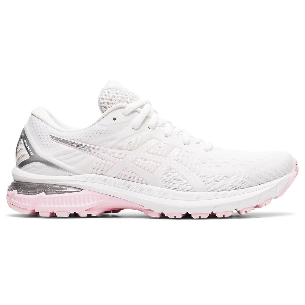 A white and pink Asics ASICS GT 2000 V9 WHITE/PINK SALT - WOMENS running shoe with a prominent logo on the side.