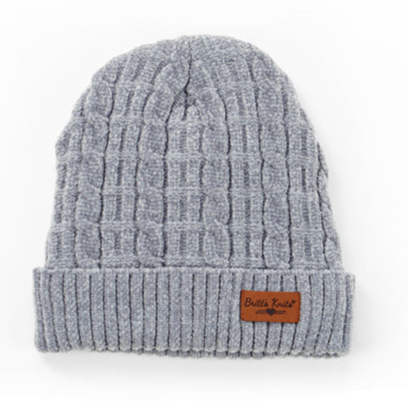 BRITS KNITS PLUSH LINED HAT GREY beanie with a leather logo patch on the cuff, ideal for cold weather.