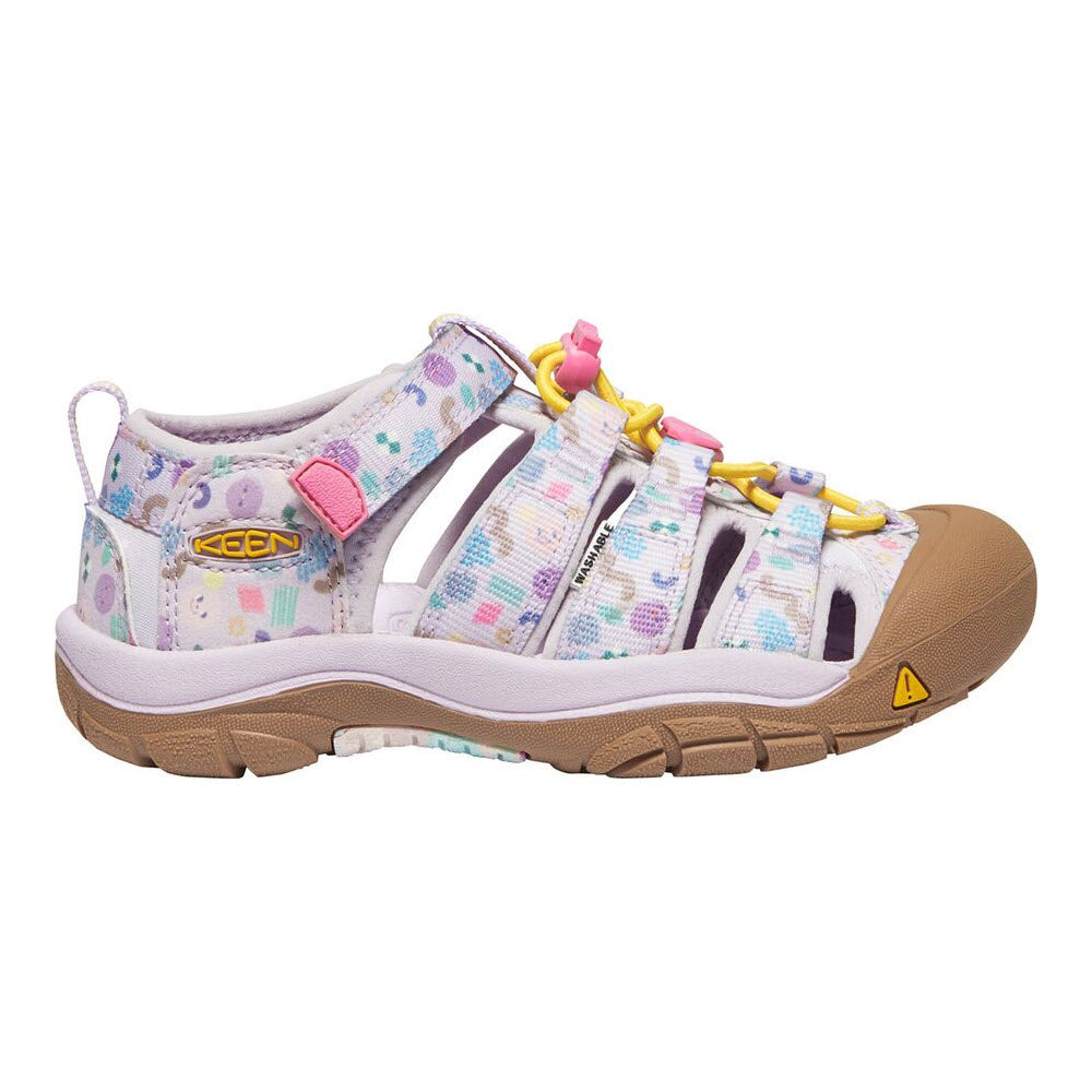 A child&#39;s multi-colored Keen Tots Newport H2 sandal with a closed toe and hook-and-loop strap, featuring washable polyester webbing.