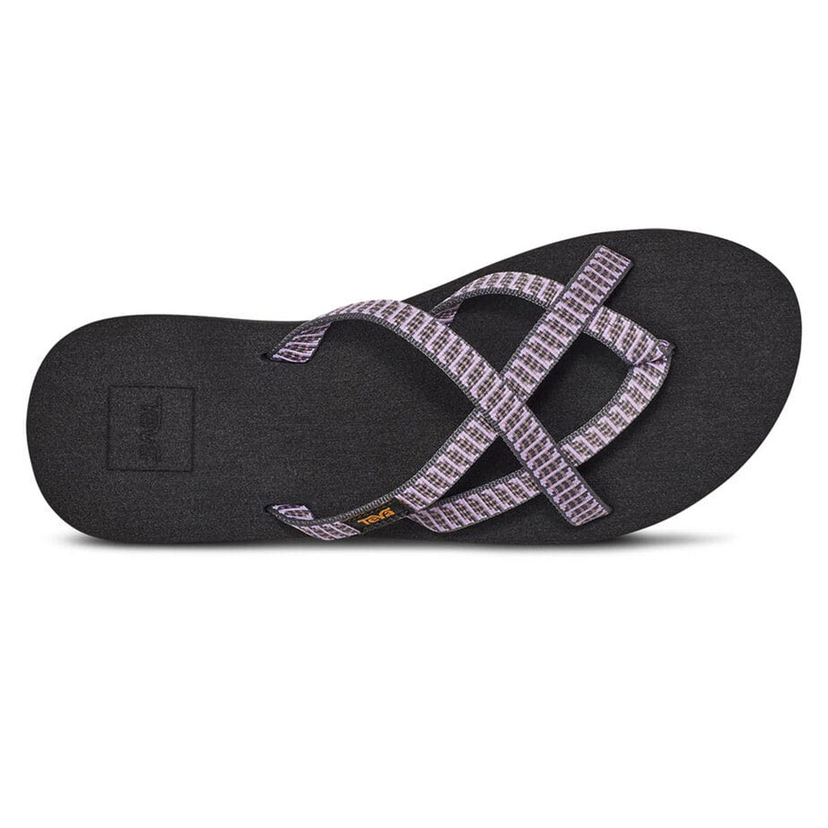 Black flip-flop with Teva Olowahu Falls Twilight Mauve - Womens REPREVE® polyester yarn patterned straps on a white background.