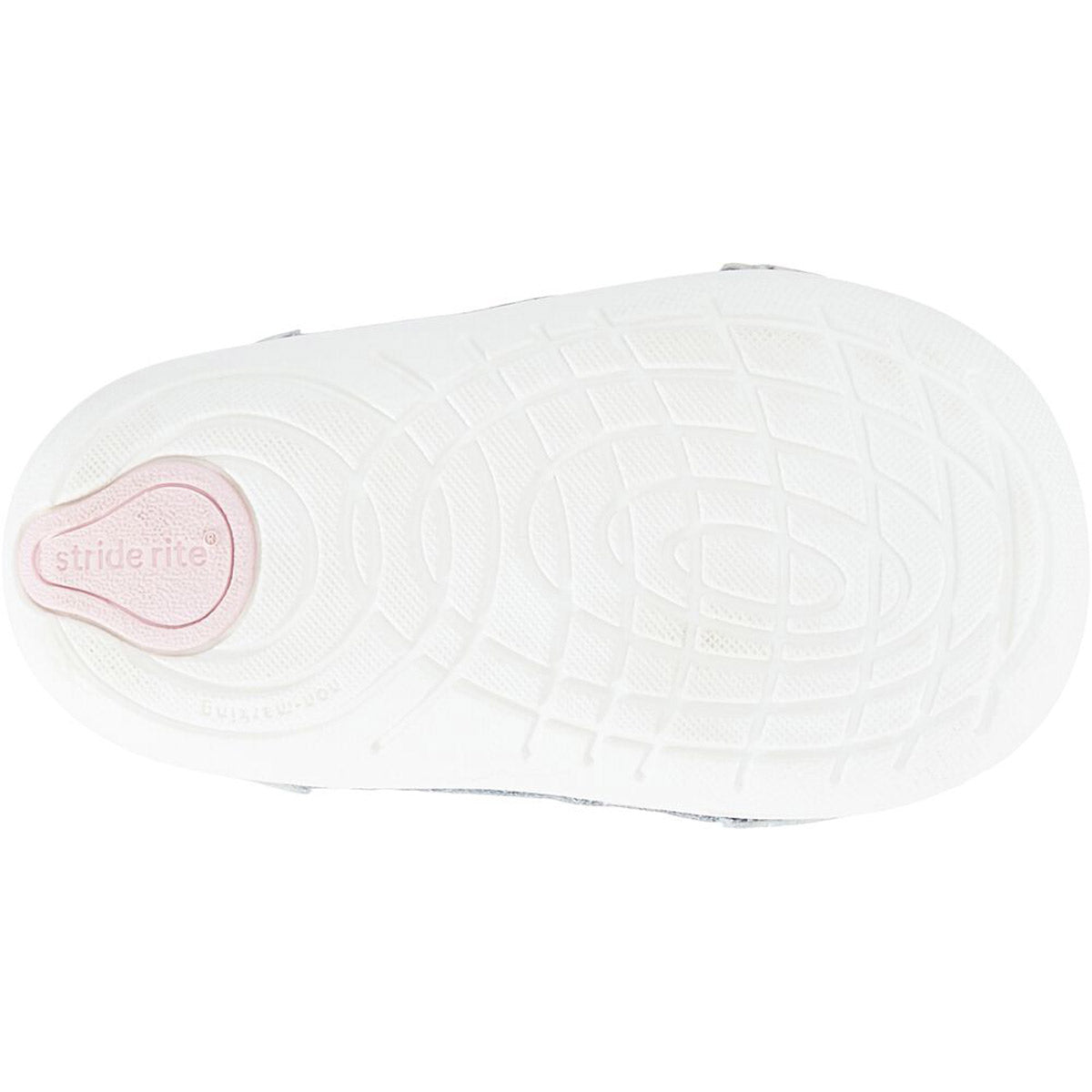 Sole of a Stride Rite shoe with a circular tread pattern, memory foam insoles, and a brand logo.