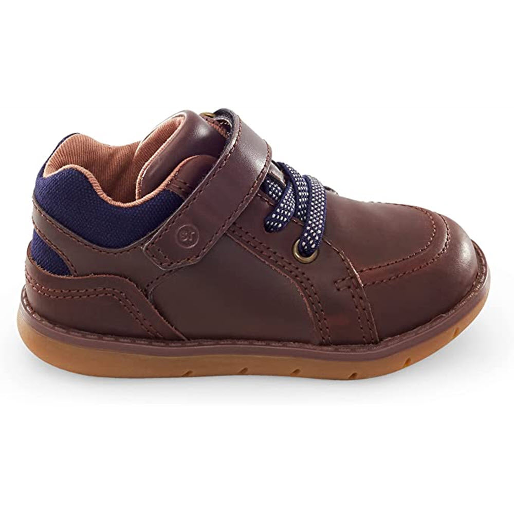 A single brown toddler&#39;s Stride Rite Anders Brown - Kids shoe with an easy on-and-off velcro strap.