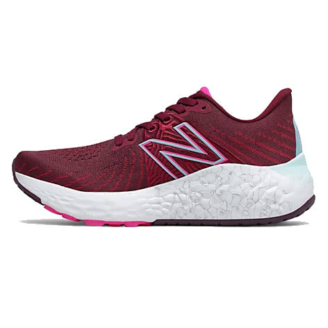 A single red and white women&#39;s New Balance Fresh Foam Vongo v5 stability running shoe with a prominent logo on the side.