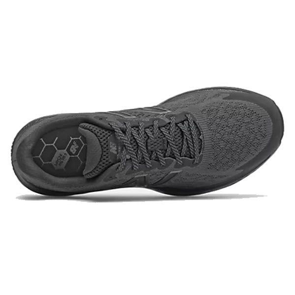 Top-down view of a New Balance men&#39;s single black running shoe with a dual-density Fresh Foam midsole.