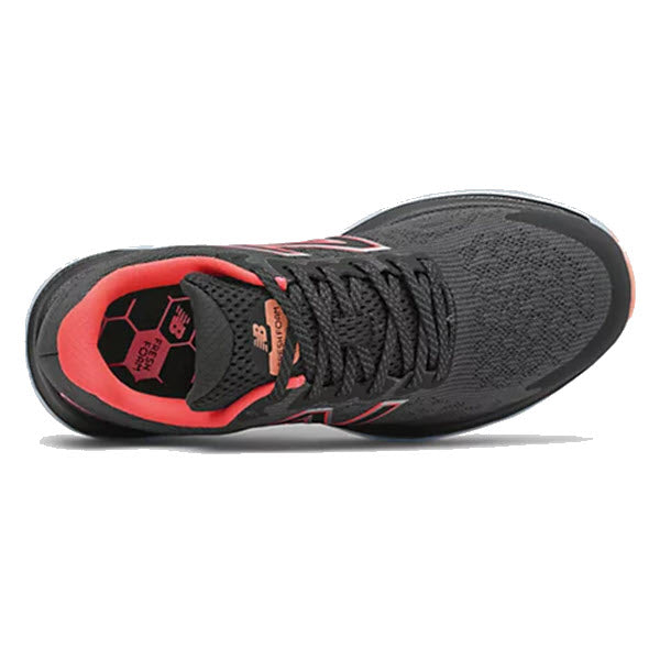 Top view of a pair of black and red New Balance Women&#39;s FreshFoam 680v7 running shoes.