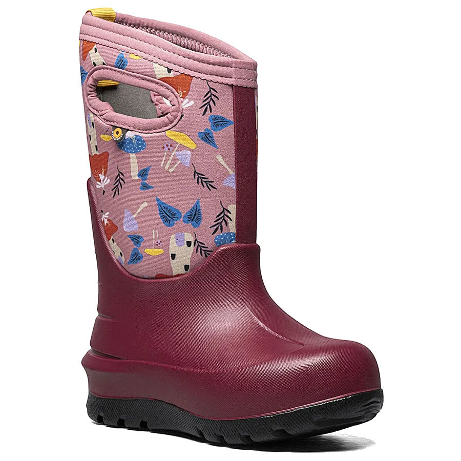Children&#39;s BOGS NEO-CLASSIC MUSHROOMS TEA ROSE MULTI - KIDS rubber boot with a colorful bird and forest print on the upper section, featuring Neo-Tech insulation for waterproof warmth.