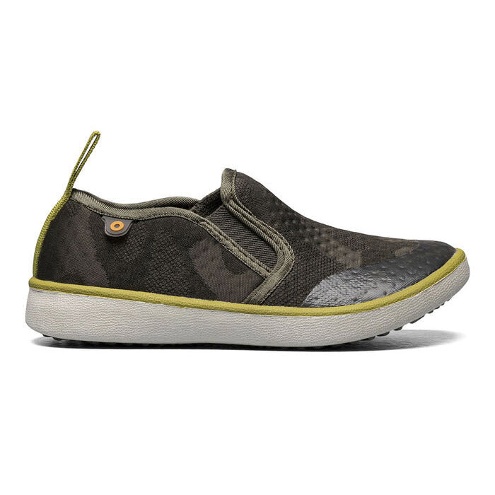A single casual slip-on Bogs Kicker, ideal for kids, featuring a washable camouflage pattern and a green trim.