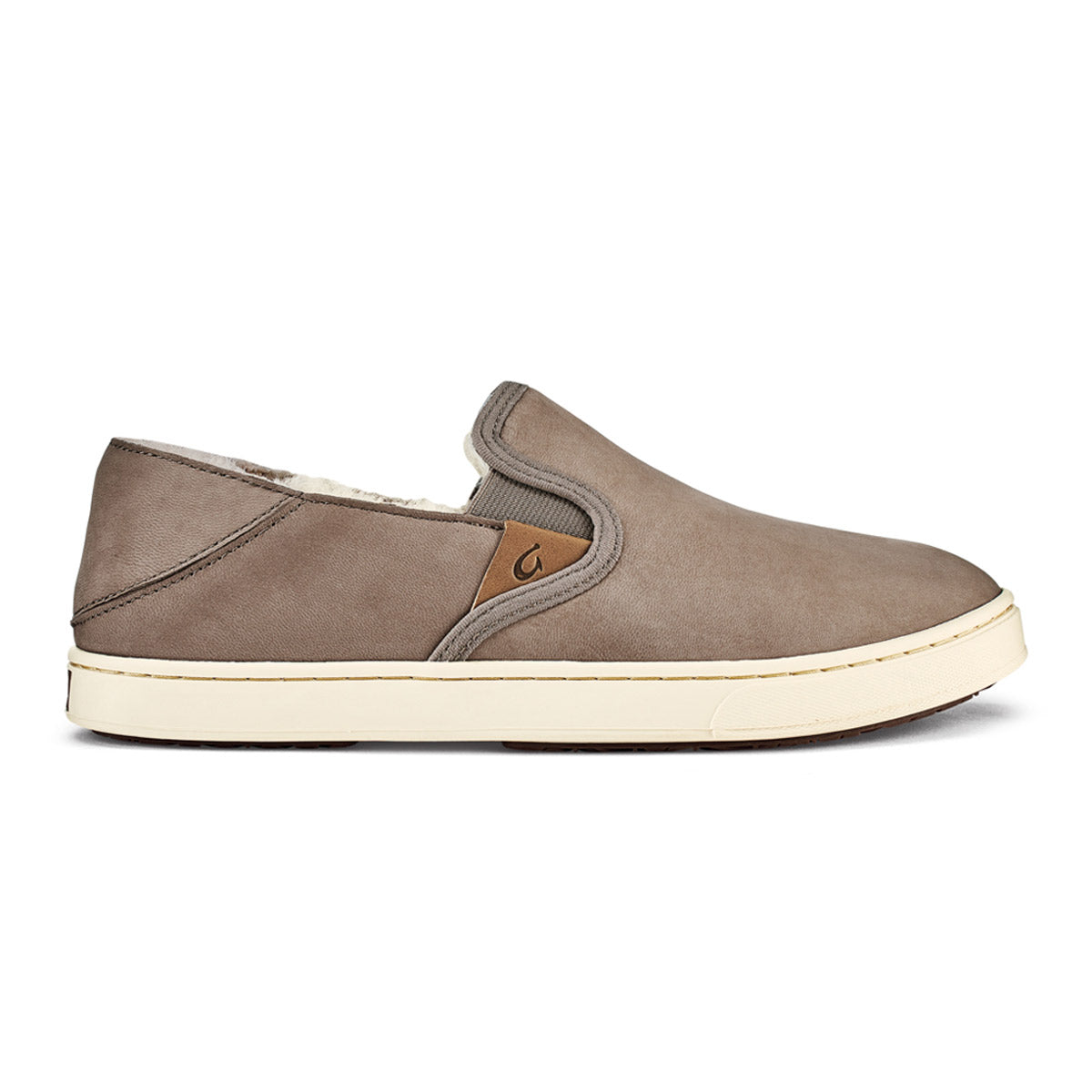 A single OLUKAI PEHUEA HEU TAUPE GREY/TAUPE GREY slip-on shoe with a white sole displayed against a white background.