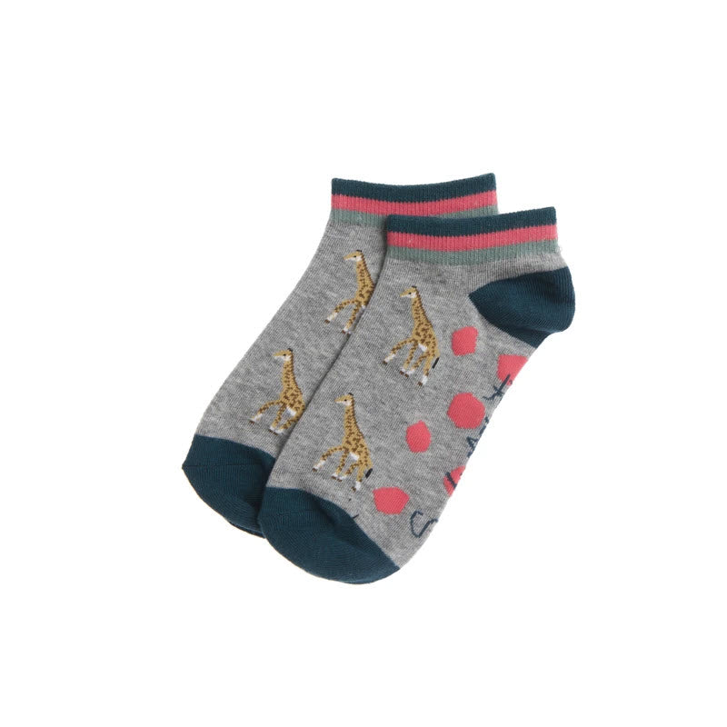 A pair of Sophie Allport Sophie Allport socks giraffe children&#39;s socks with giraffe motifs and polka dots on a white background.