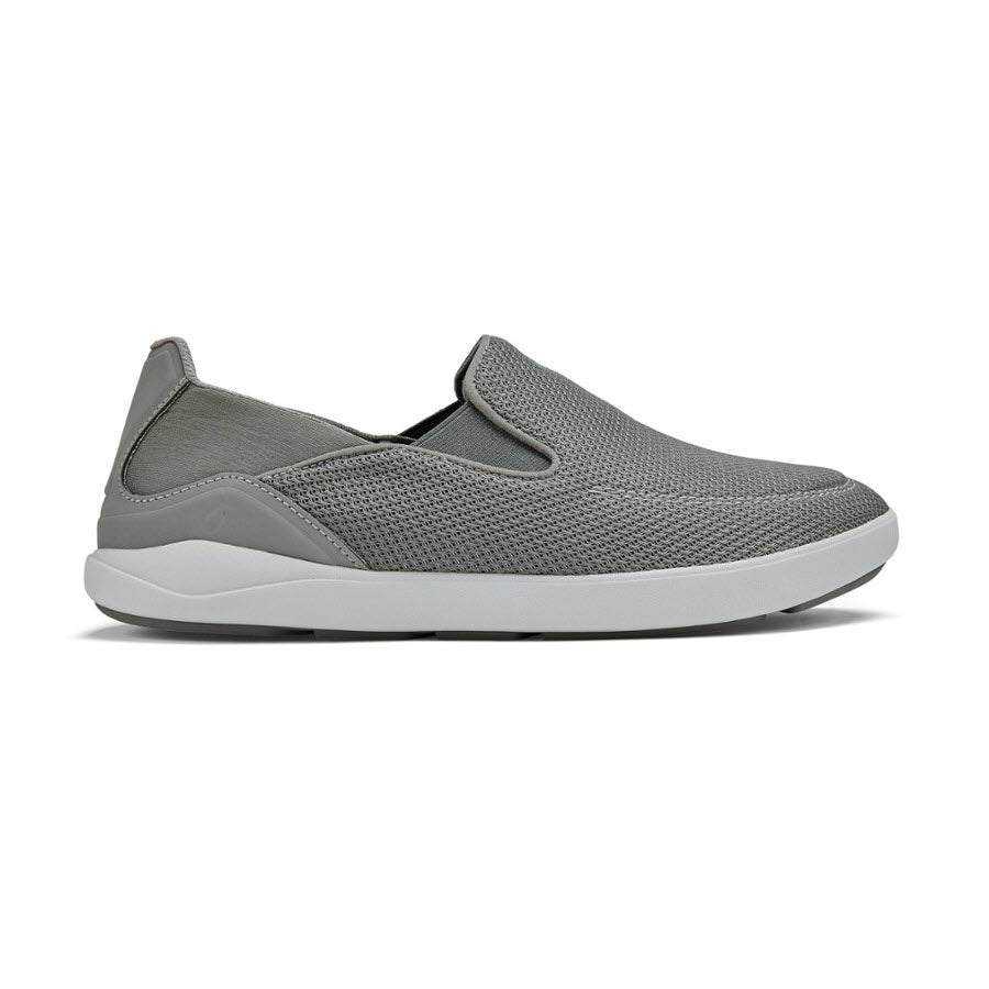 A single grey Olukai Nohea Pae slip-on sneaker with a white sole.
