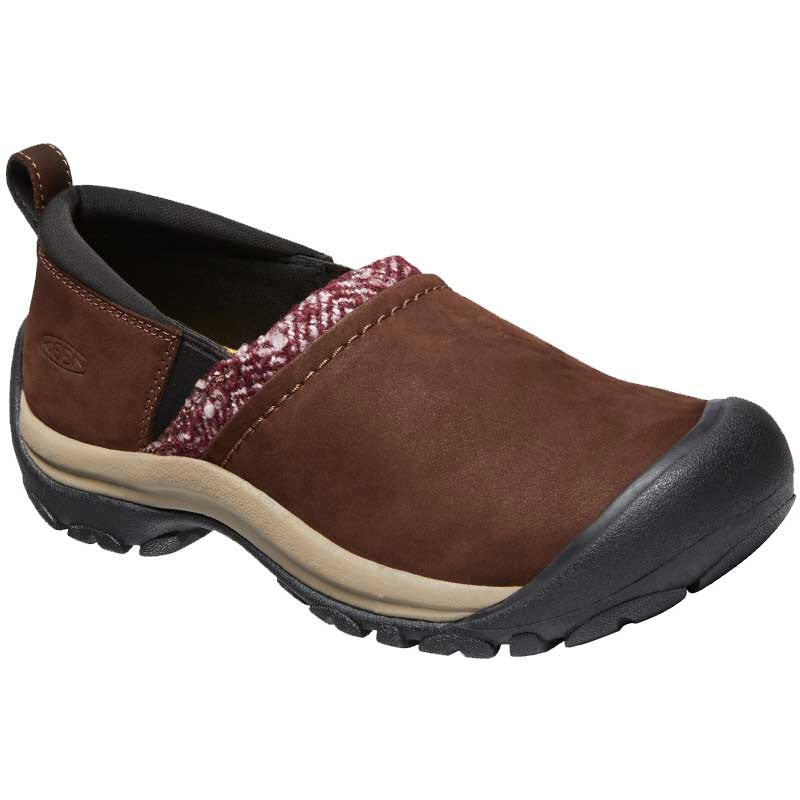 Brown Keen women&#39;s casual slip-on shoe with a cream sole, decorative textile band, and non-marking rubber outsole.