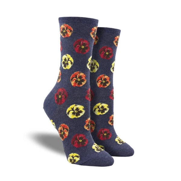 A pair of Socksmith Blooming Pansies crew socks in navy blue for women, featuring a floral print on a white background.