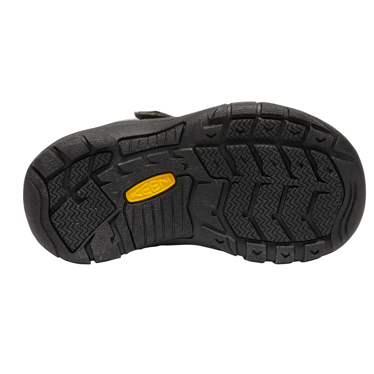 Black rubber sole of a KEEN NEWPORT SHOE STEEL GREY/BRILLANT BLUE - KIDS with tread pattern and a yellow Keen logo.
