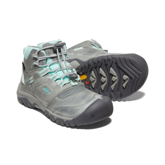 A pair of Keen Ridge Flex Mid Child hiking boots in the color grey/blue tint, displayed on a white background, showing both the top and the sole of one shoe.
