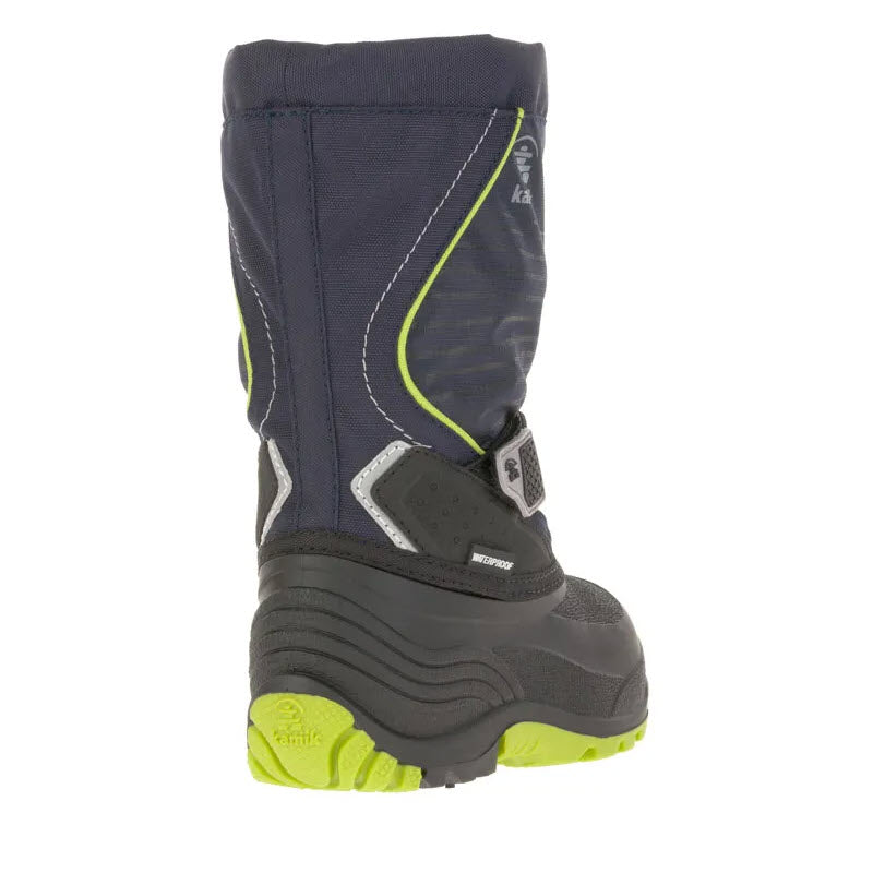 A single Kamik Snowfall Navy/Lime kid&#39;s boot, waterproof with velcro closure and a green sole, -40°F comfort rated.