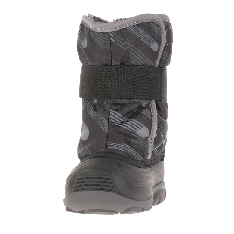 A Kamik toddler&#39;s winter boot with adjustable velcro strap and RubberHe bottoms.