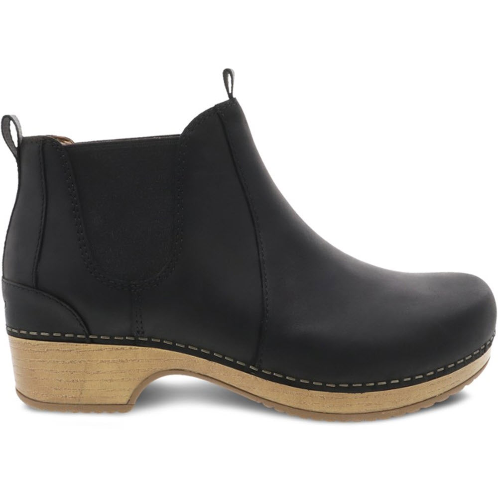 Dansko Becka Black - Women nubuck uppers chelsea boot with a wooden heel.