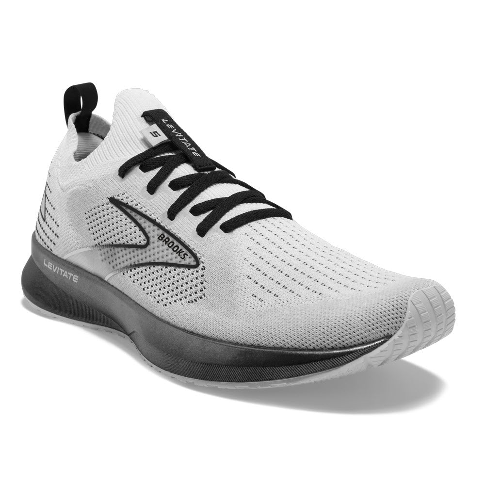 White and black Brooks Levitate StealthFit 5 Running Shoe with DNA AMP cushioning on a white background.