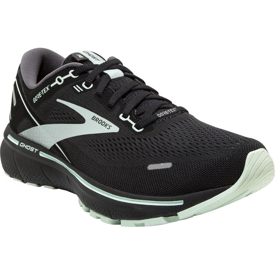 A black and white Brooks Ghost 14 GTX running shoe with Gore-Tex technology and DNA Loft cushioning.