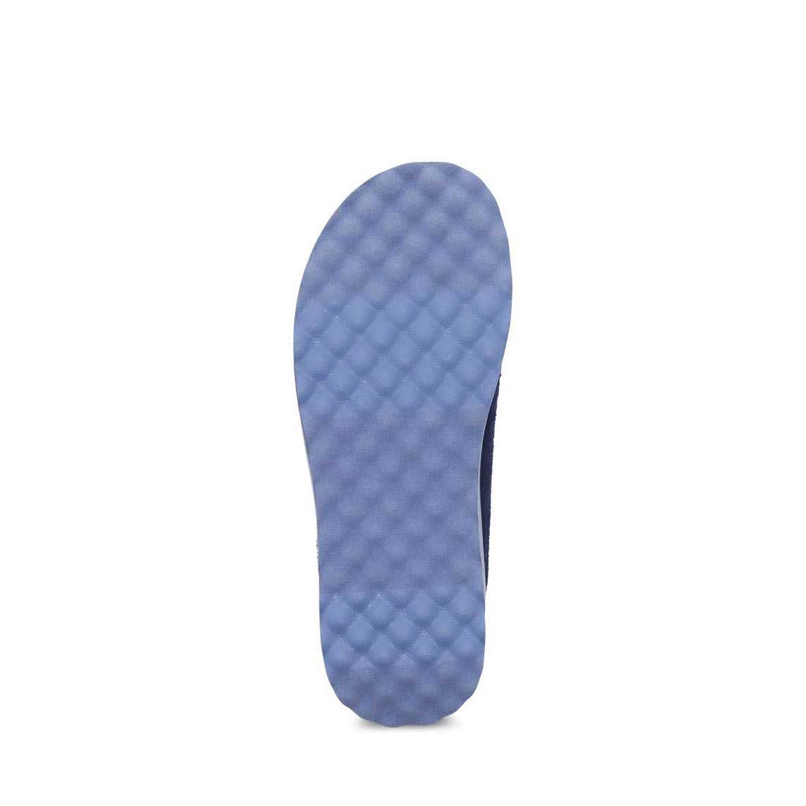 Dansko navy wool shoe insole with arch support and a diamond pattern texture.