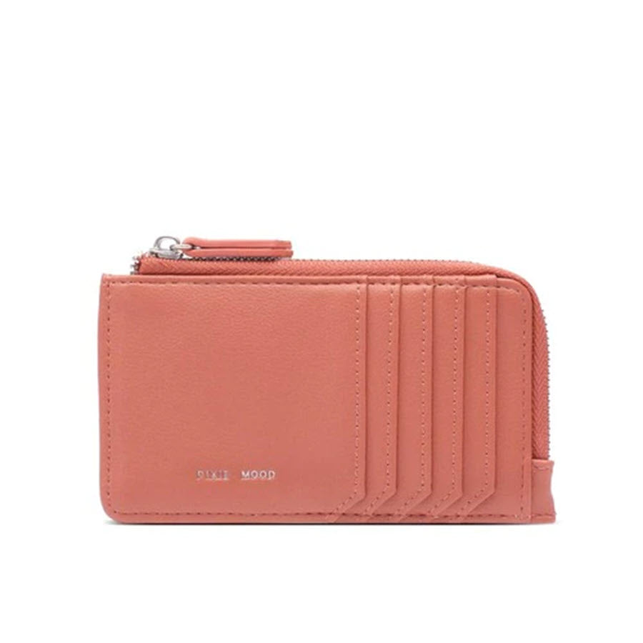 Pixie Mood Quinn Card Wallet Desert in coral pink with card slots and zip around compartment on a white background.