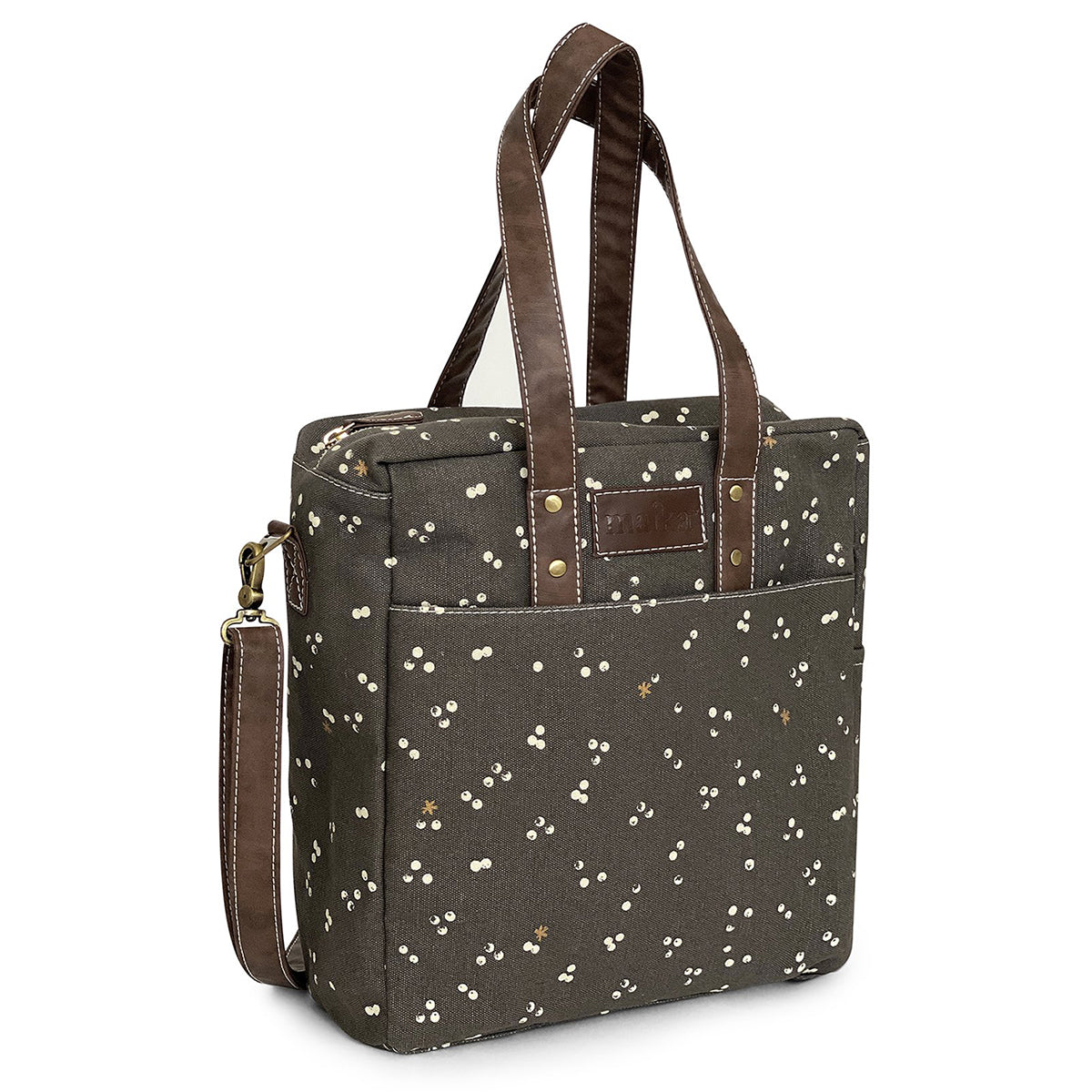 Olive green floral-patterned Maika Commuter Tote Nochi with leather straps and a detachable shoulder strap.