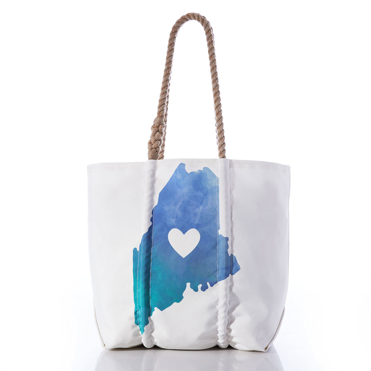 A Sea Bags medium tote bag, handcrafted from recycled sail cloth, with a blue watercolor-style print and a heart design centered on the front, featuring braided rope handles.