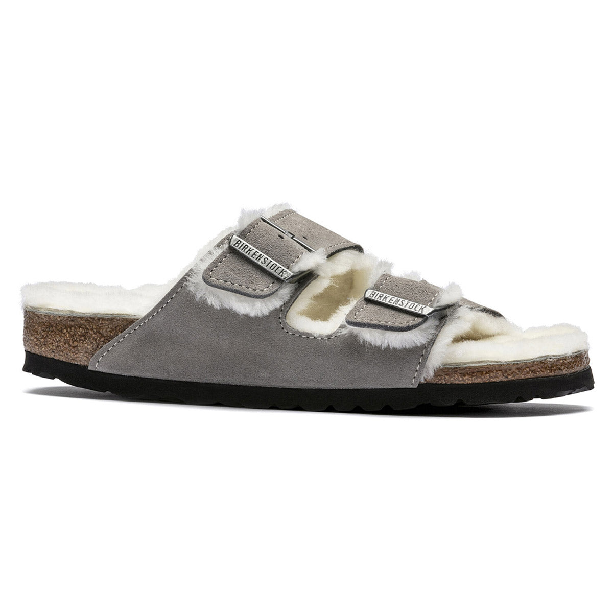 A single grey suede shearling Birkenstock Arizona sandal with adjustable straps and a cork-latex footbed.