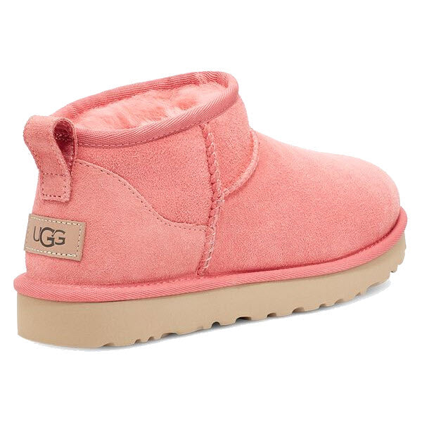 Pink Twinface sheepskin Ugg boot for toddlers.