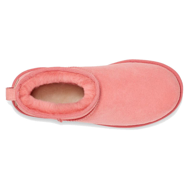A single pink Ugg Classic Ultra Mini slipper on a white background.