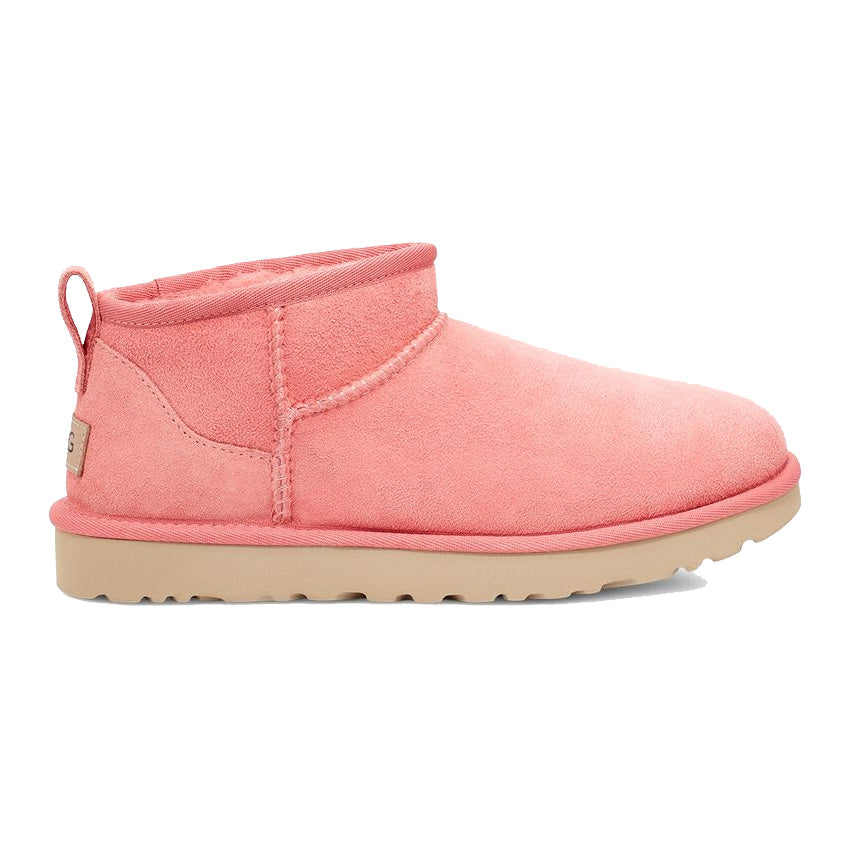 UGG Classic Ultra Mini pink blossom ankle boot by Ugg on a white background.
