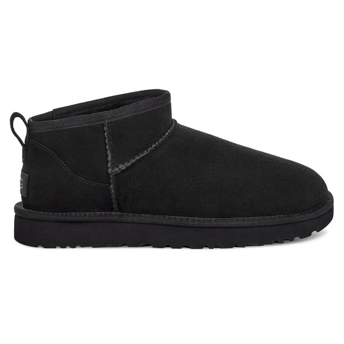 Black suede ankle boot with a Treadlite by Ugg outsole and a rear pull tab.