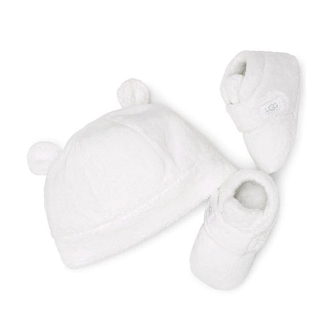 A white UGG Bixbee and Beanie Blanc de Blanc - Kids hat with bear ear beanie and snuggly soft booties set on a white background.