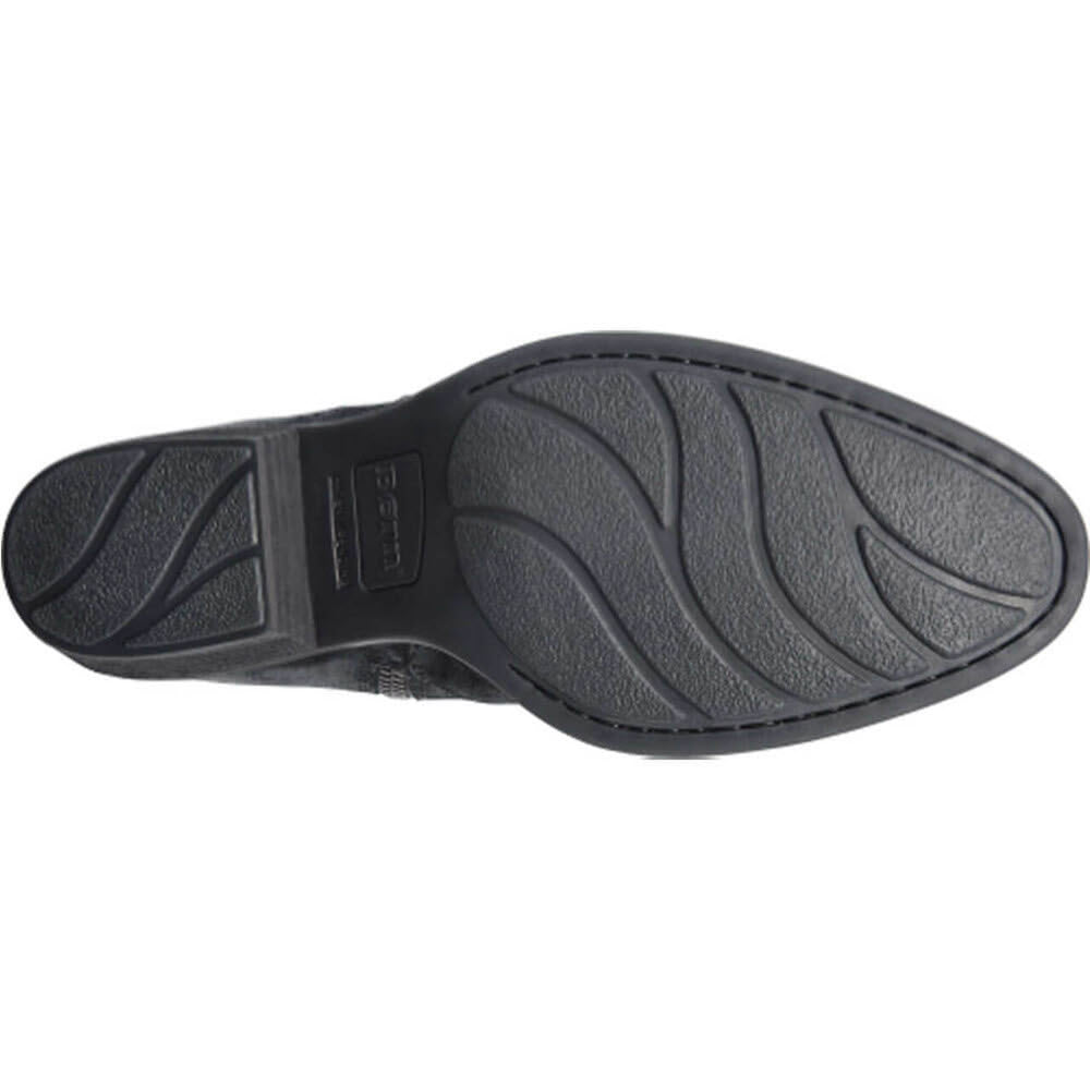 Born McKenzie black rubber outsole shoe with tread pattern.
