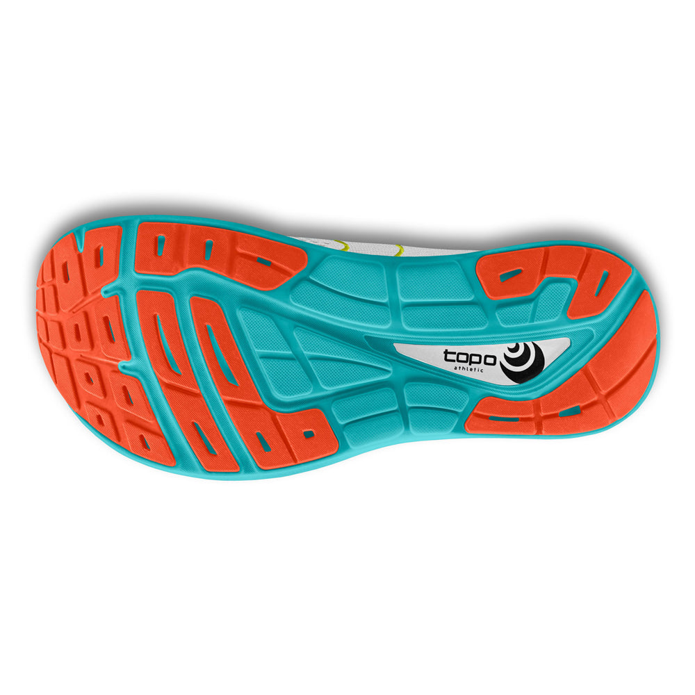 Tread pattern of a blue and orange Topo Phantom 2 White/Sky - Womens running shoe sole, designed with ZipFoam™ core for improved cushioning and response.