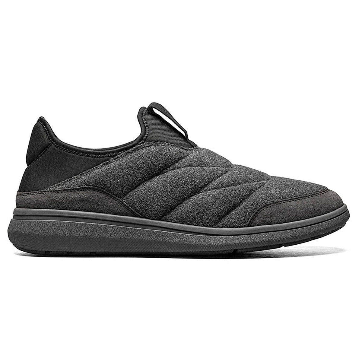 A single black FLORSHEIM JAVA MOC WOOL CHARCOAL - MENS slip-on sneaker with a water-resisting quilted wool upper design and a pull tab on the heel.