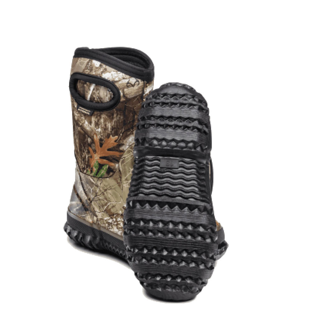 A pair of Perfect Storm Cloud Hi Camo patterned rubber boots with thick treads.
