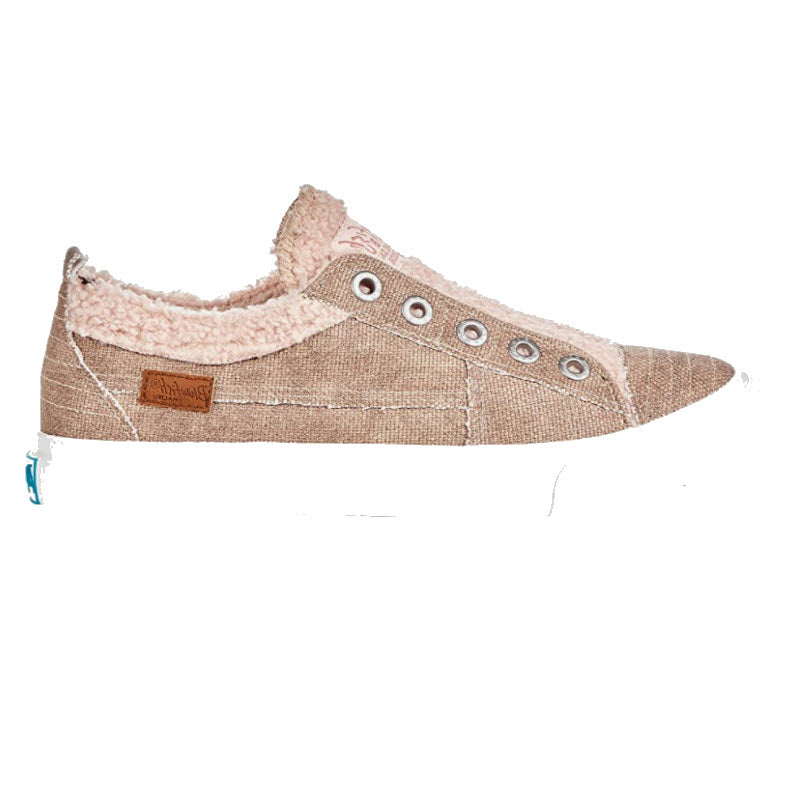 A side view of a single BLOWFISH PLAYDOE SHERPA ROSE GOLD METALLIC - WOMENS sneaker with a faux-fur lining and a small brown logo patch.