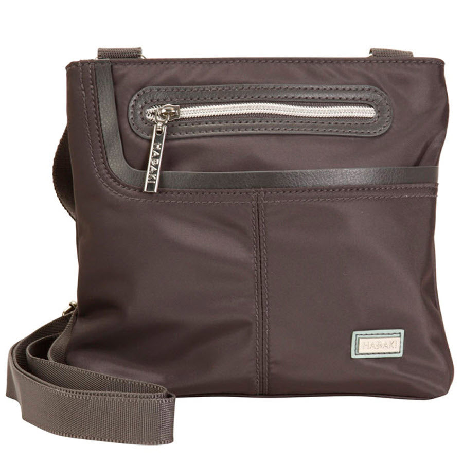 Hadaki Mini Me Asphalt crossbody bag with external zippered pocket.
