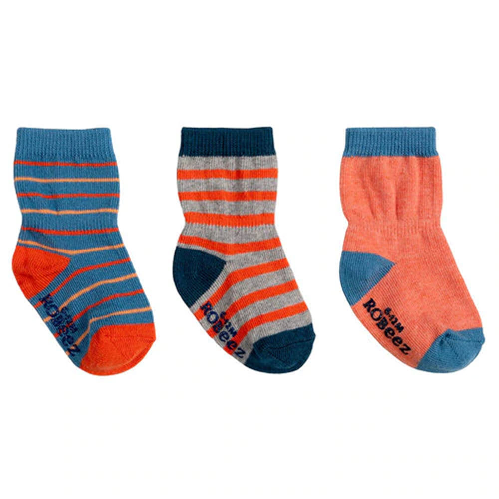 Three pairs of Robeez Jack 3 Pack Socks for children with varying patterns and colors displayed side by side, featuring a non-skid application.