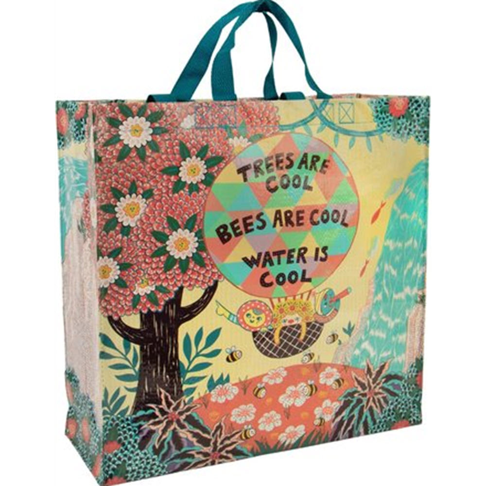 Colorful Blue Q Shopper Tote Trees and Bees made from recycled materials, with a nature-inspired design and the text &quot;trees are cool, bees are cool, water is cool.