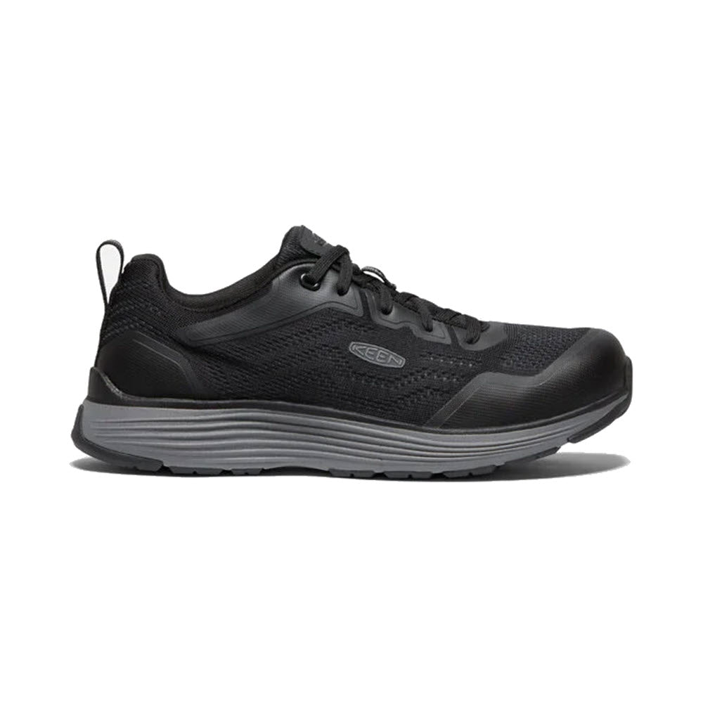 Black athletic walking shoe with a gray sole and Keen.ReGEN midsole on a white background.